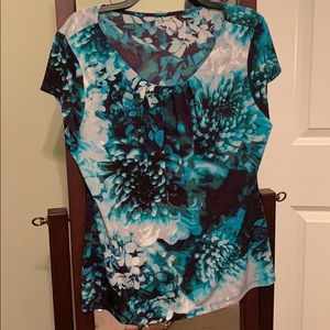 A colorful blue blouse